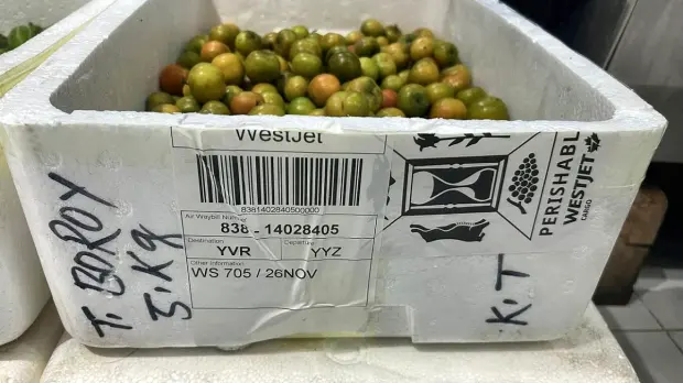 A perishable air waybill routing a consignment onward to Vancouver